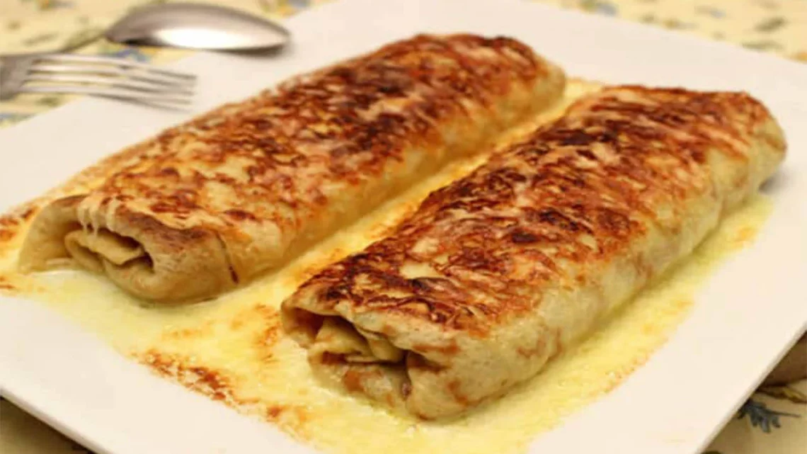 Ficelle Picarde: crêpe garnie de jambon et champignons