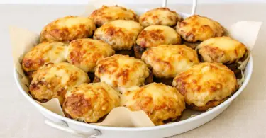 Champignons farcis au jambon et au comté : une recette gratinée