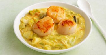 Saint-Jacques fondue de poireaux à l’orange : un plat festif pour les fêtes de Noël