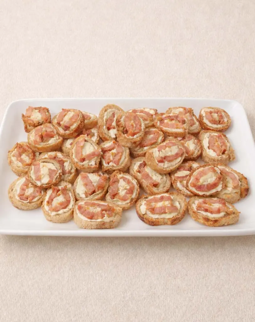 Tartinettes apéritives chèvre–lardons et jambon–gruyère